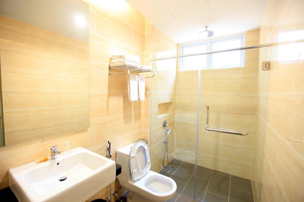 Merdeka Suites Hotel Miri Chambre photo