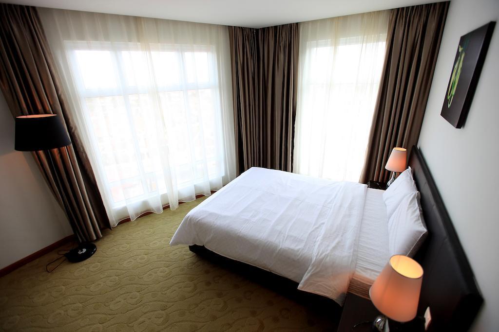 Merdeka Suites Hotel Miri Chambre photo